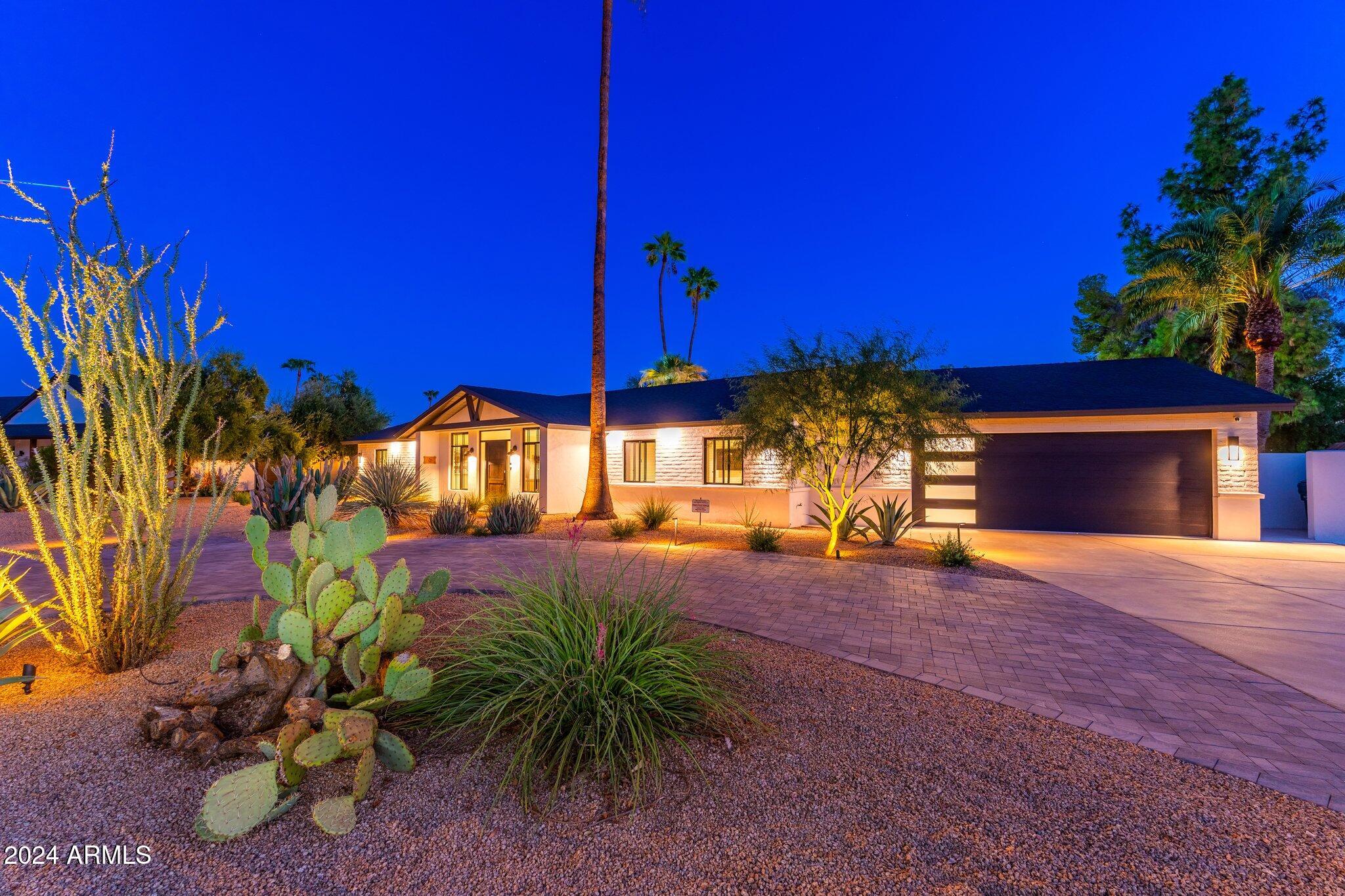 6025 East Charter Oak Road Scottsdale, AZ 85254 - Photo 75 of 115 a view of a house with a patio