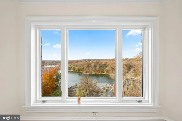 a view of a glass door and a window