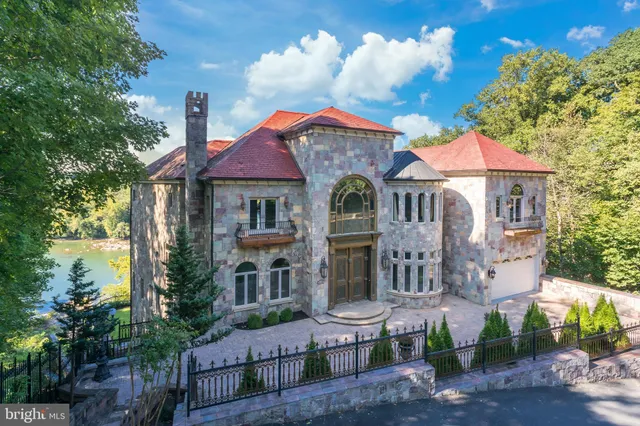 a front view of a house with a porch