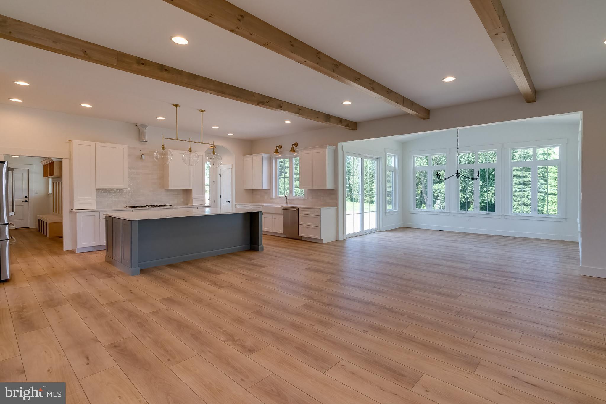 383 Thatcher Lane Lititz, PA 17543 - Photo 8 of 18 a view of kitchen with kitchen island and stainless steel appliances