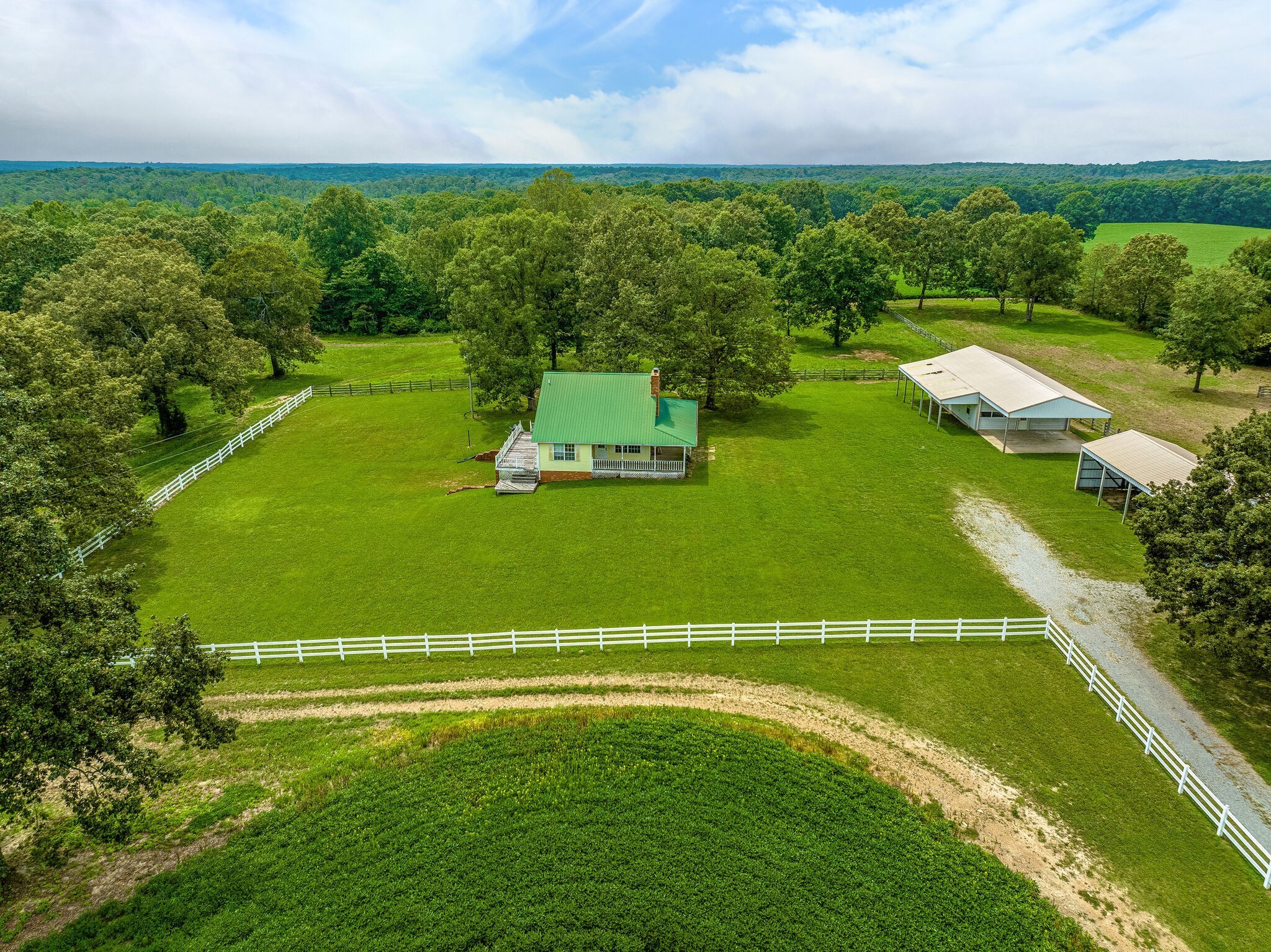a view of a golf course with a lake