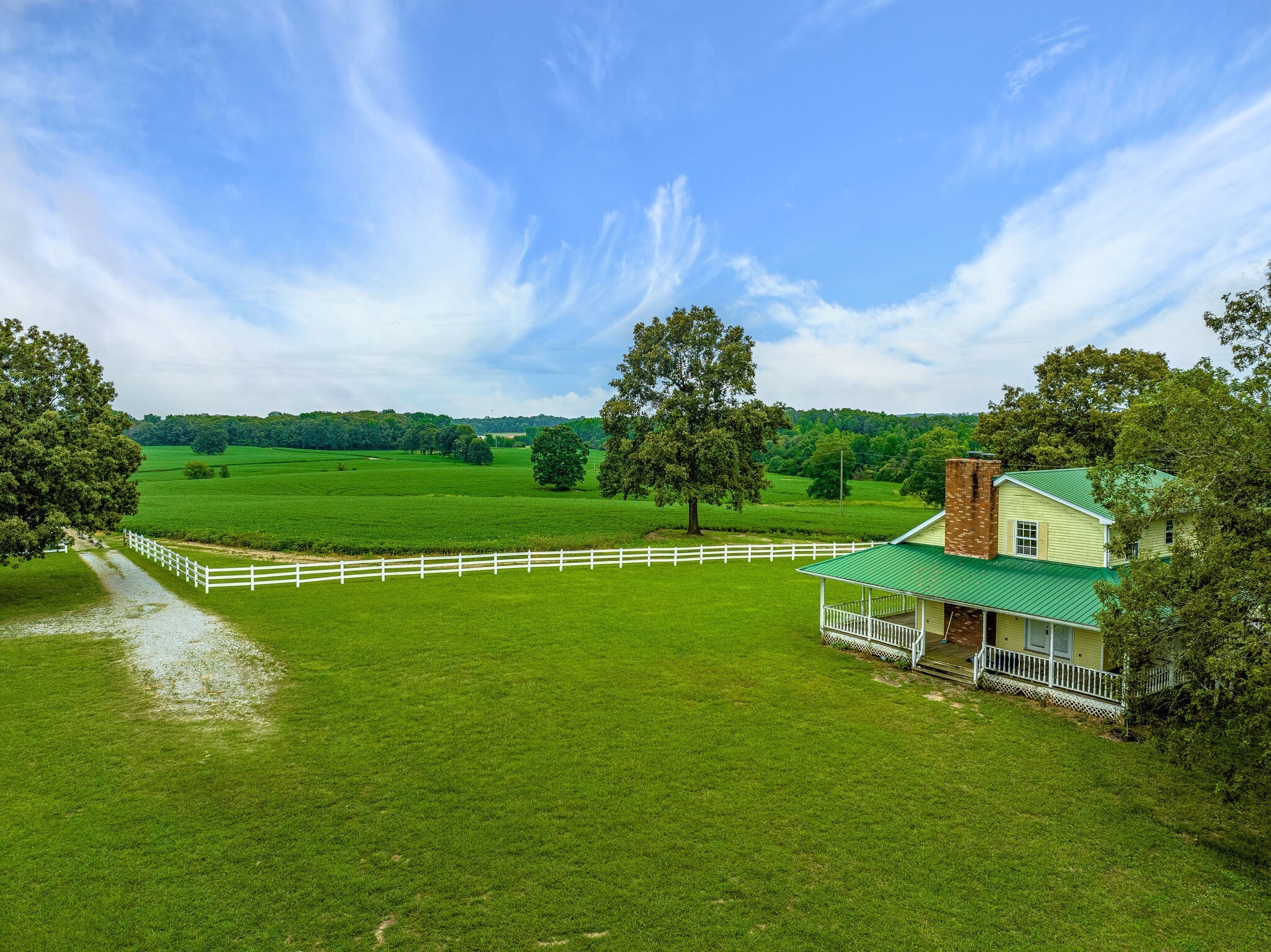 2385 Sylvia Road Dickson, TN 37055 - Photo 19 of 46 a view of a park with a bench and a lake view