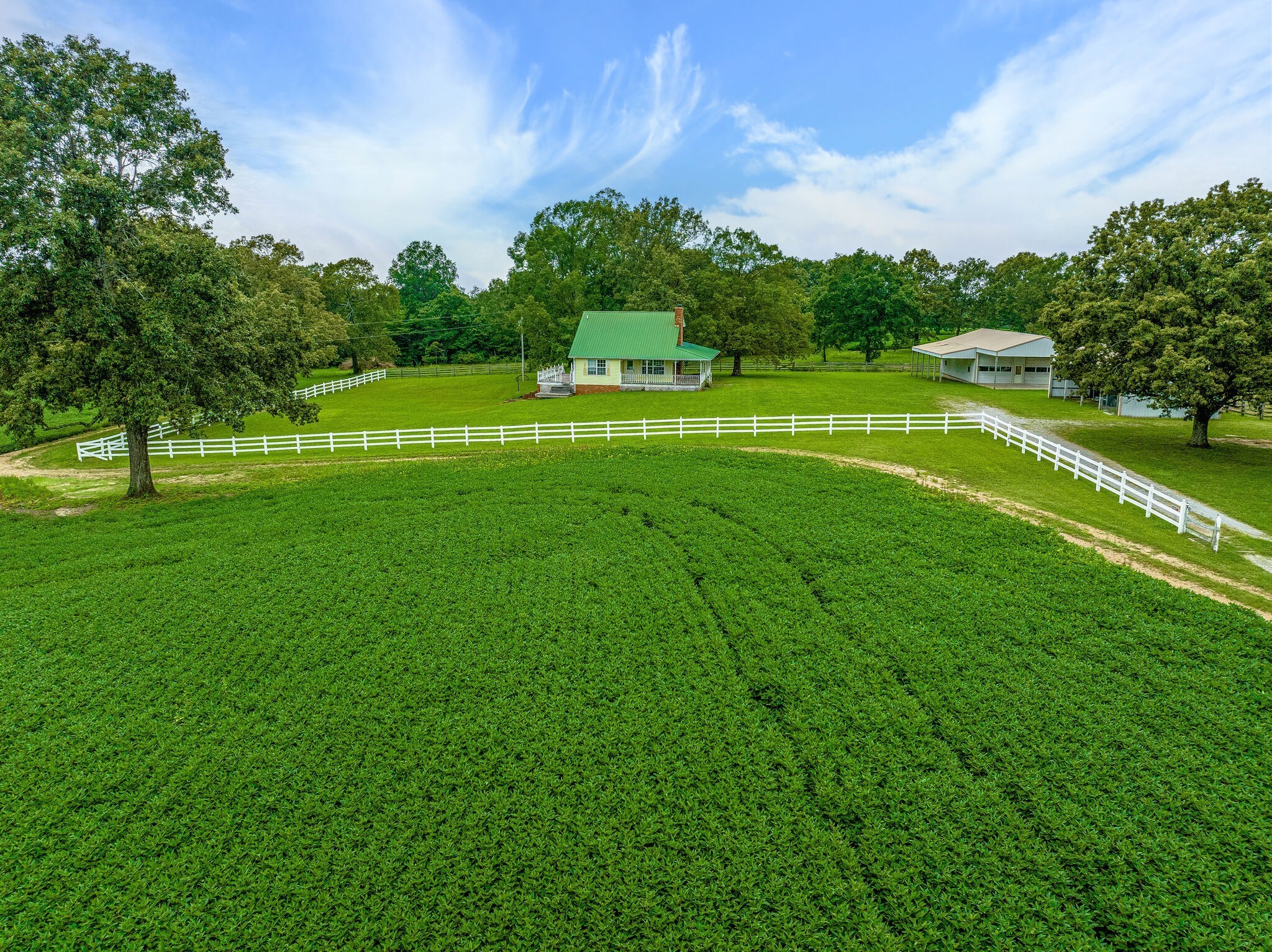 2385 Sylvia Road Dickson, TN 37055 - Photo 27 of 46 a view of a golf course with a lake