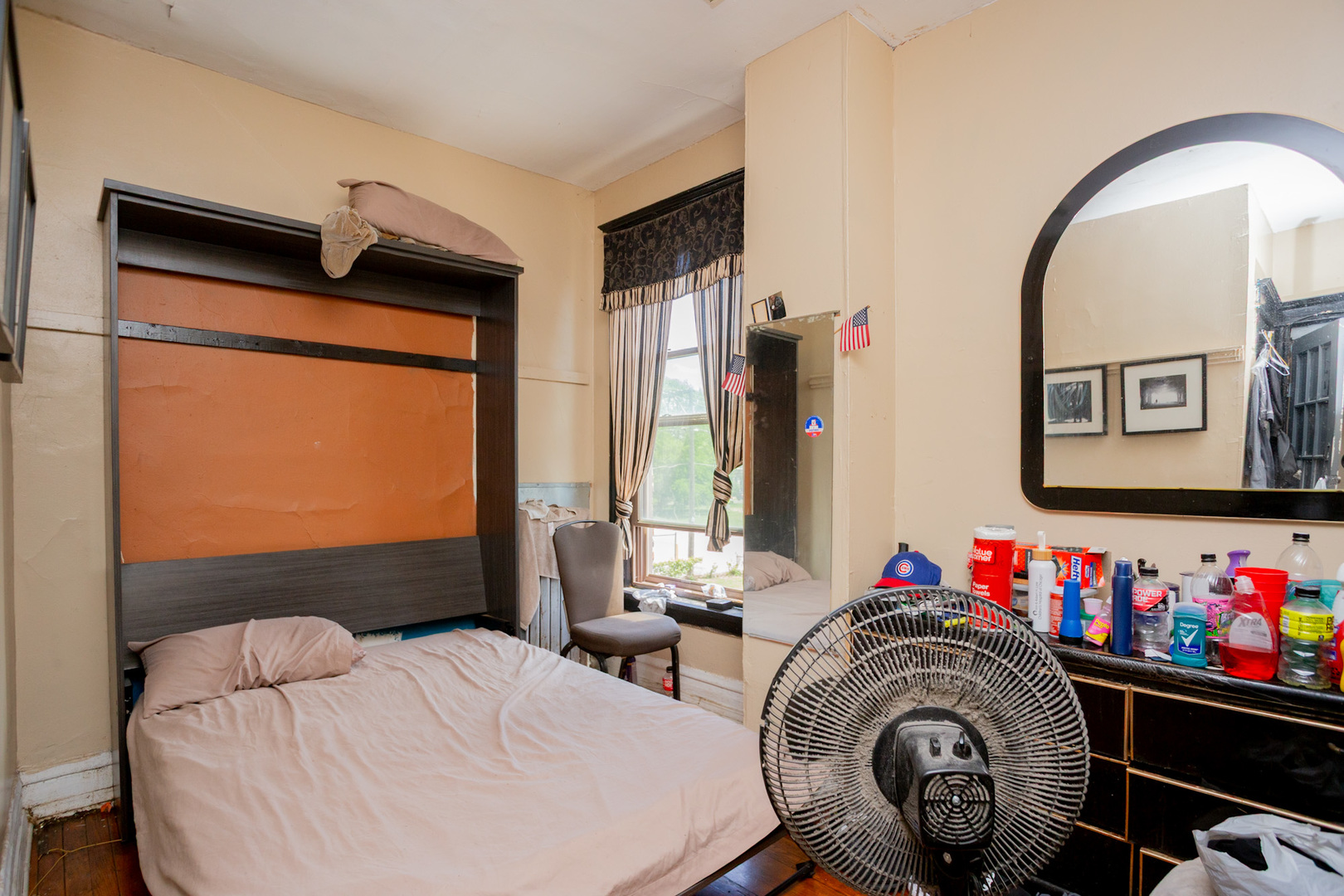 6049 South Champlain Avenue Chicago, IL 60637 - Photo 20 of 46 a bedroom with furniture and a bed