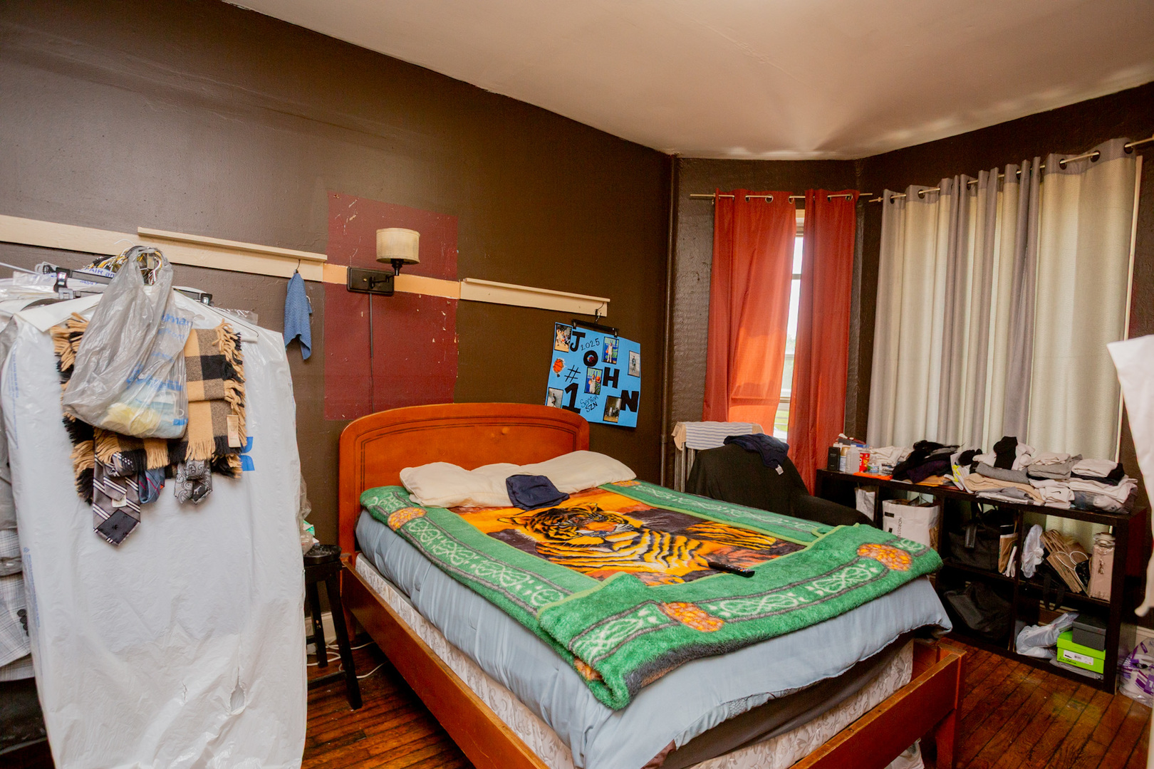 6049 South Champlain Avenue Chicago, IL 60637 - Photo 31 of 46 a bedroom with a bed and a window