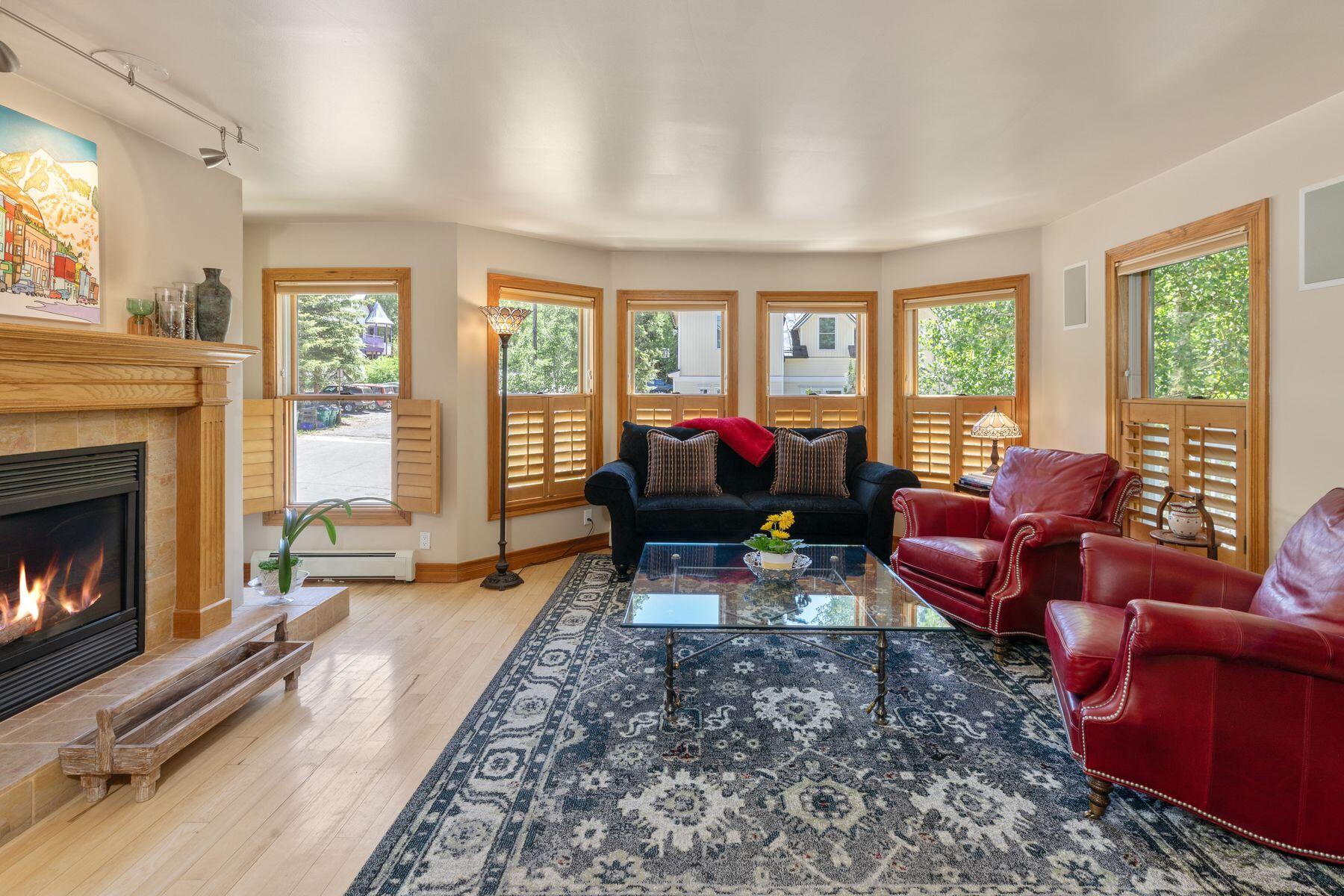 239 North Davis Street Telluride, CO 81435 - Photo 19 of 42 a living room with furniture and a fireplace