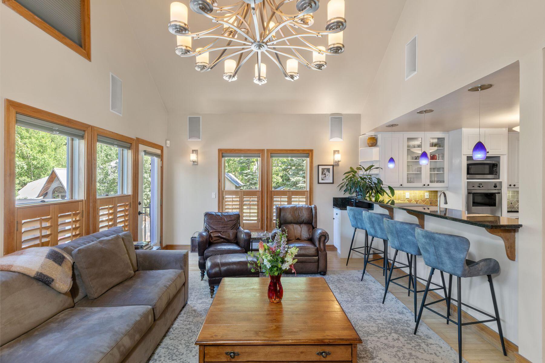 239 North Davis Street Telluride, CO 81435 - Photo 8 of 42 a living room with furniture and a large window