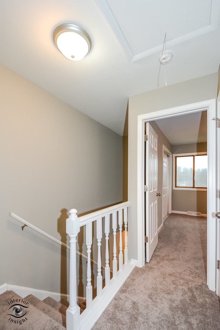 266 Circlegate Road New Lenox, IL 60451 - Photo 16 of 25 a view of a livingroom with wooden floor and a window