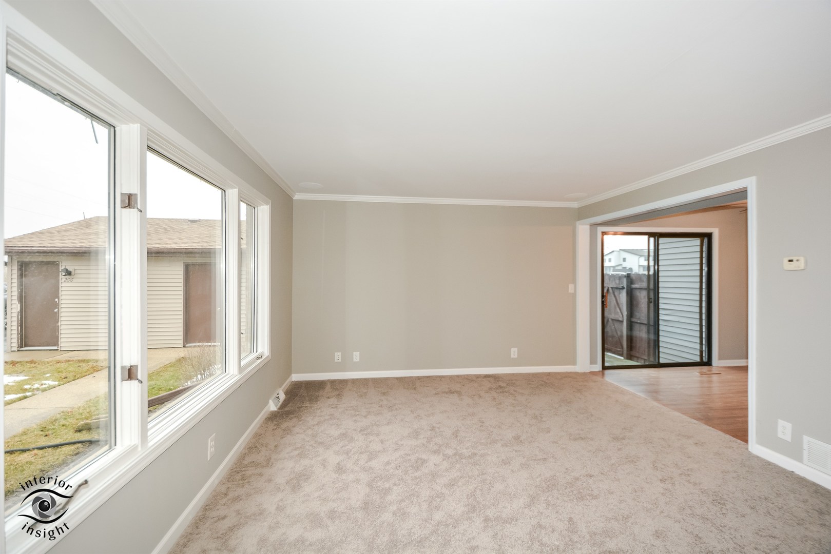 266 Circlegate Road New Lenox, IL 60451 - Photo 3 of 25 a view of an empty room with a window