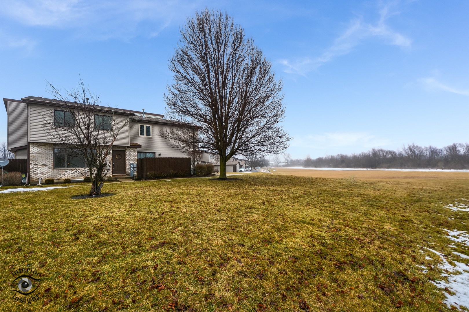 266 Circlegate Road New Lenox, IL 60451 - Photo 24 of 25 a view of a large house with a yard