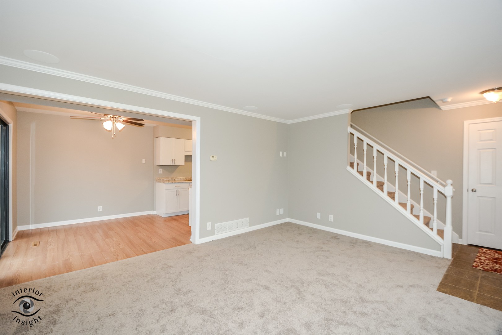 266 Circlegate Road New Lenox, IL 60451 - Photo 5 of 25 a view of an empty room with wooden floor and a bathroom