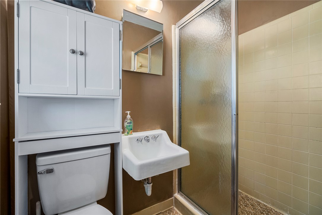 312 Edwards Drive Anderson, SC 29626 - Photo 18 of 44 A compact bathroom offers essential fixtures and tiled shower for convenient daily routines.