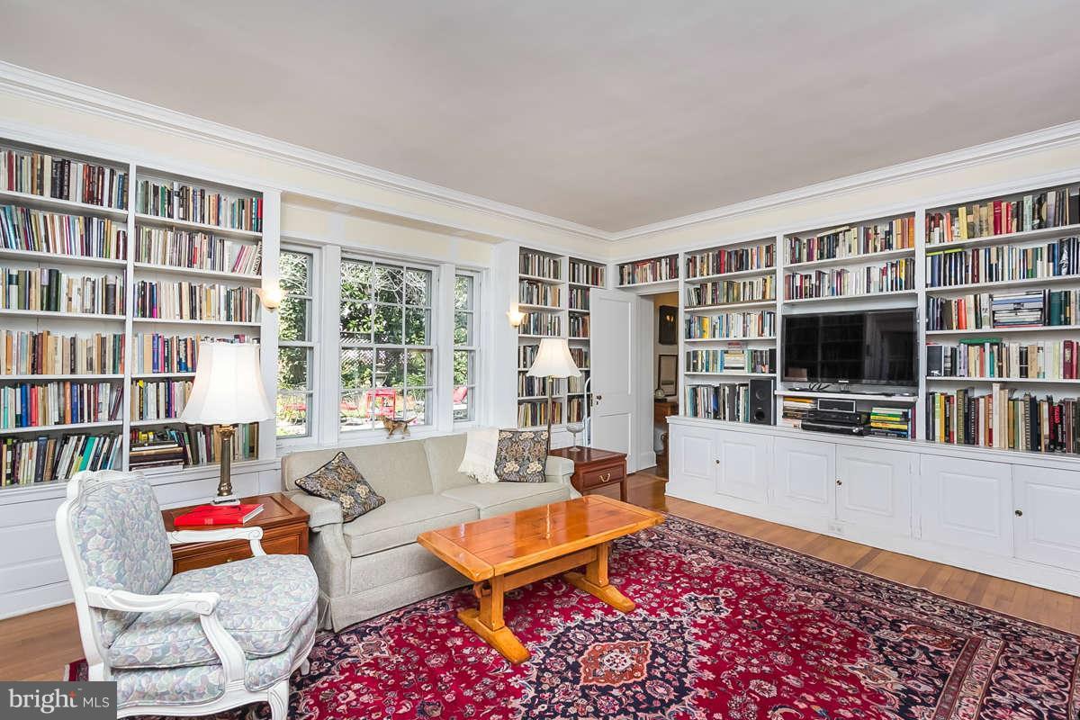 14 East Bishops Road Baltimore, MD 21218 - Photo 11 of 28 a living room with furniture and a flat screen tv