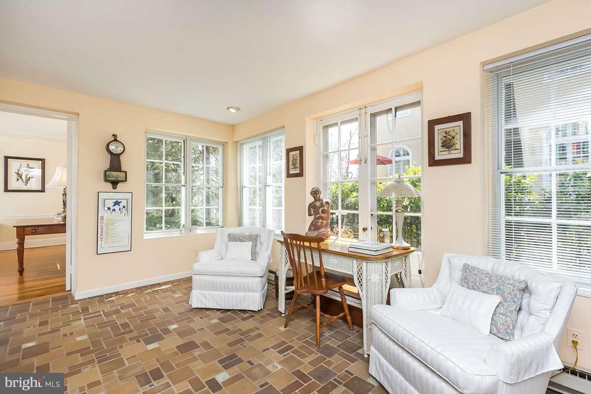 14 East Bishops Road Baltimore, MD 21218 - Photo 15 of 28 a living room with furniture and a large window