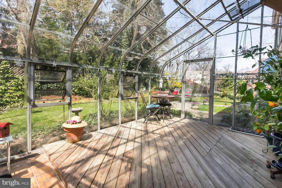 14 East Bishops Road Baltimore, MD 21218 - Photo 16 of 28 a view of a chairs and table in the backyard