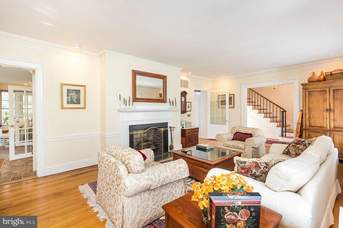 14 East Bishops Road Baltimore, MD 21218 - Photo 4 of 28 a living room with furniture and a fireplace
