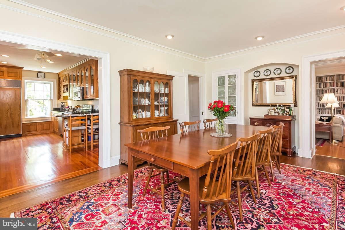 14 East Bishops Road Baltimore, MD 21218 - Photo 6 of 28 a view of a dining room with furniture and wooden floor
