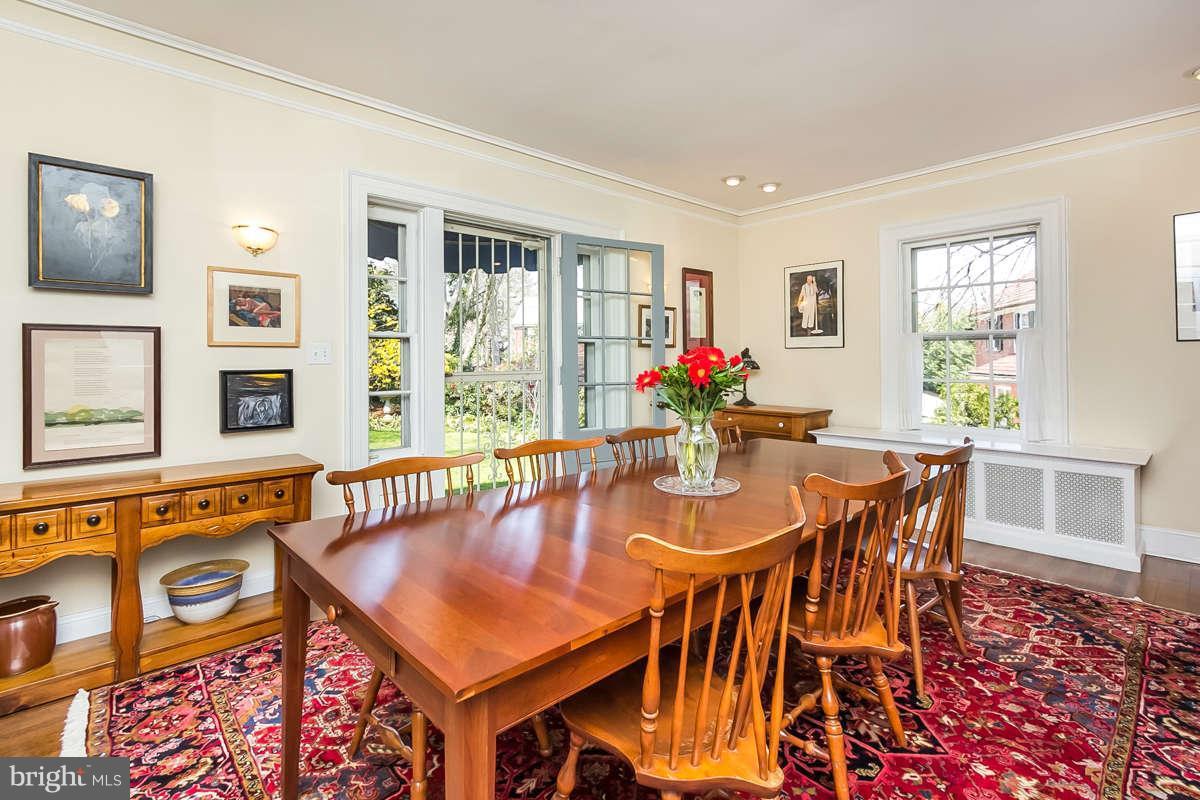 14 East Bishops Road Baltimore, MD 21218 - Photo 9 of 28 a dining room with furniture window and wooden floor