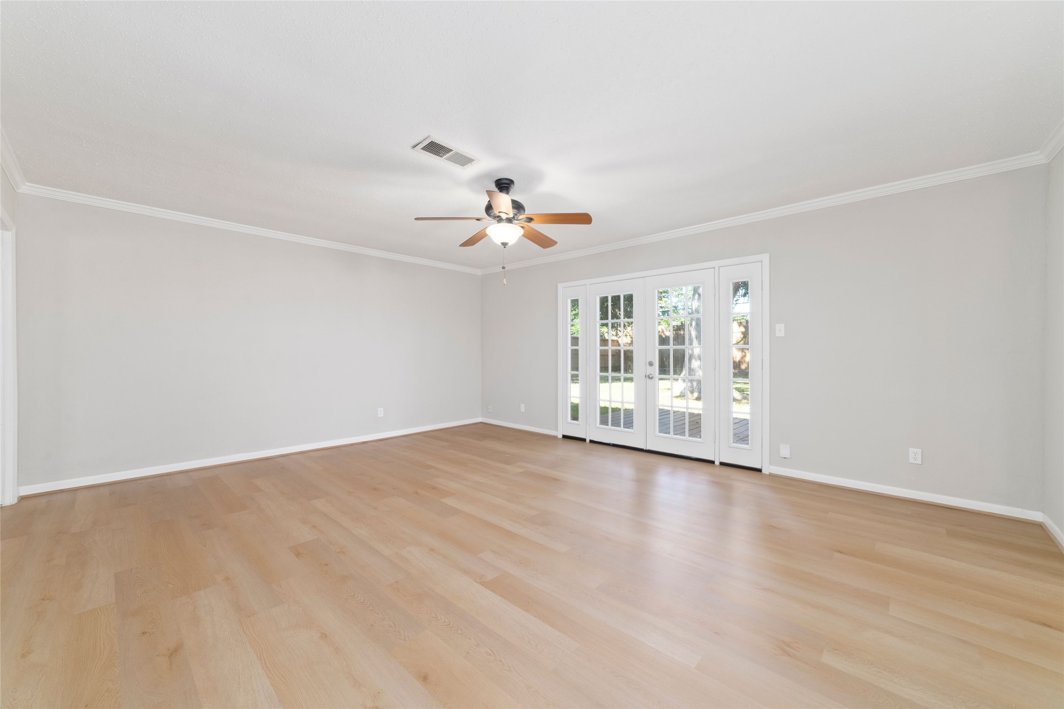 11426 Endicott Lane Houston, TX 77035 - Photo 22 of 40 Another view of the den looking toward the french doors leading to the backyard.