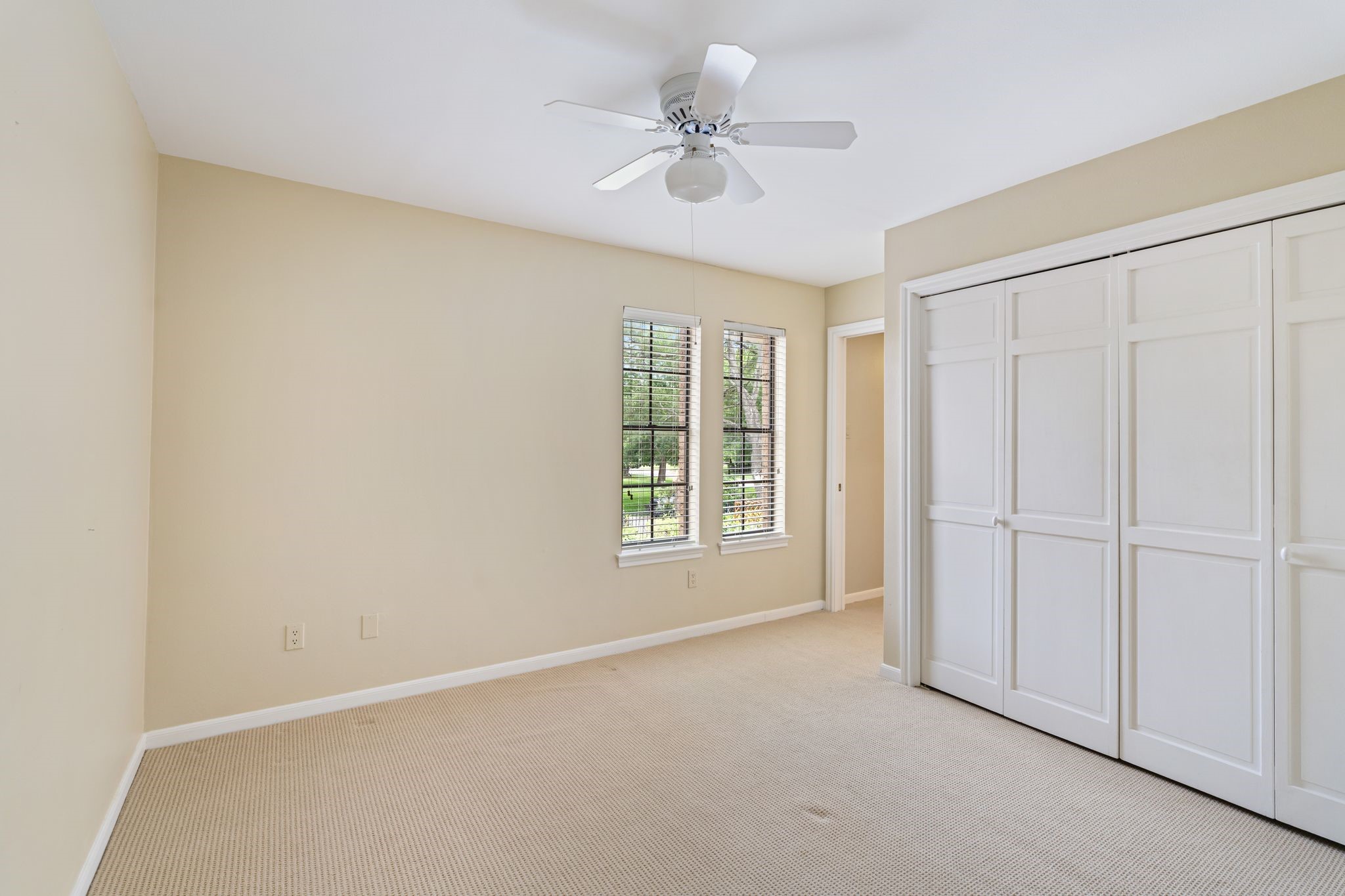 7416 Kelving Street Houston, TX 77030 - Photo 30 of 35 an empty room with windows and fan