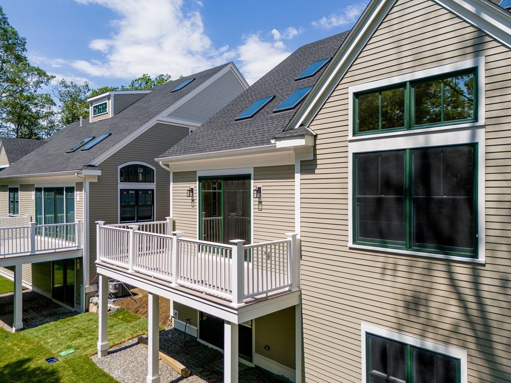 18 Talbot Lane, Unit 18 Reading, MA 01867 - Photo 17 of 33 a house view with a outdoor space