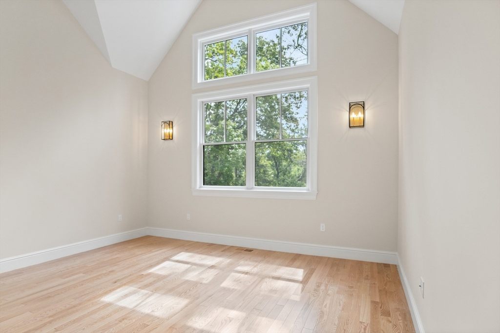 18 Talbot Lane, Unit 18 Reading, MA 01867 - Photo 18 of 33 an empty room with a window