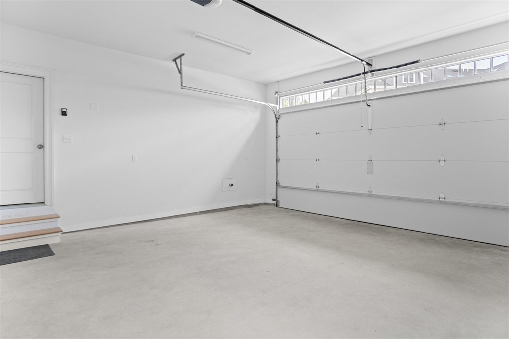 18 Talbot Lane, Unit 18 Reading, MA 01867 - Photo 6 of 33 a view of a garage
