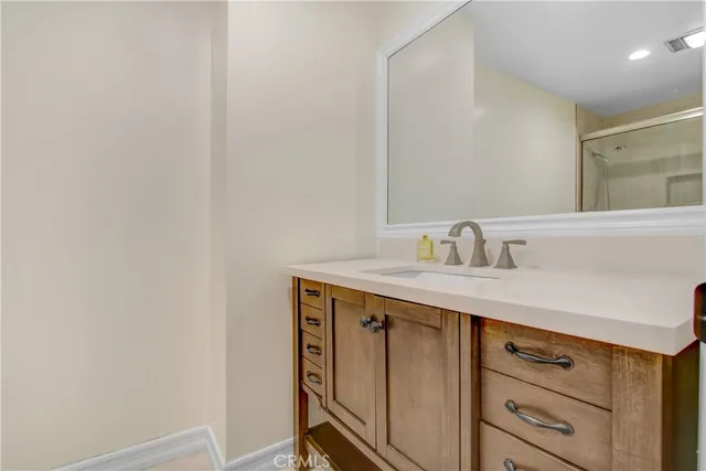 a utility room with sink dryer and washer