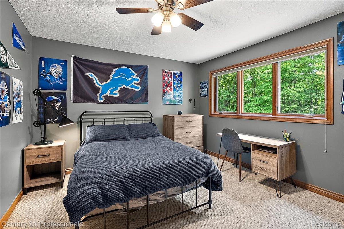 9867 Rainbow Ridge Drive Schoolcraft, MI 49087 - Photo 41 of 82 Bedroom with neutral carpeting and gray walls