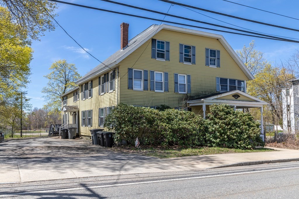 48 West Broadway Gardner, MA 01440 - Photo 2 of 21 a front view of a house with a yard