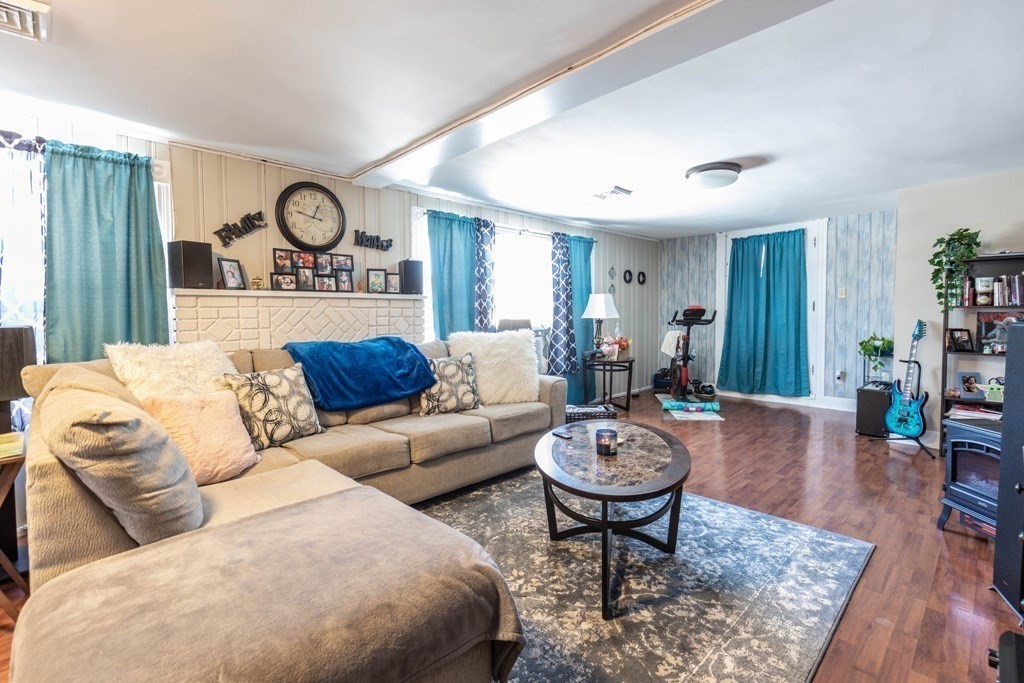 48 West Broadway Gardner, MA 01440 - Photo 4 of 21 a living room with furniture a rug and window