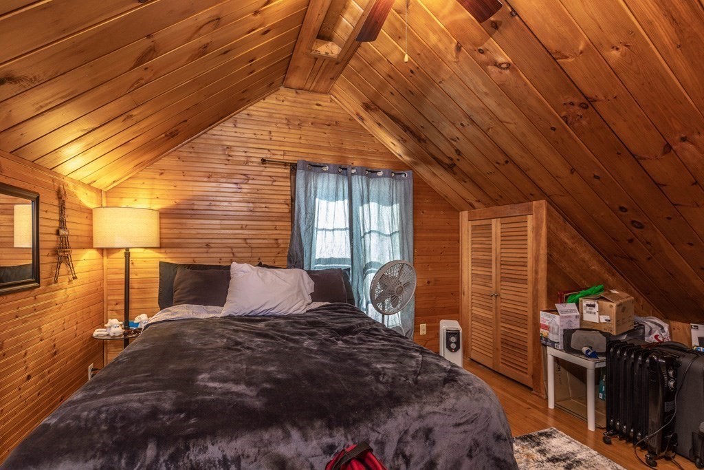 48 West Broadway Gardner, MA 01440 - Photo 9 of 21 a bedroom with a bed and wooden floor