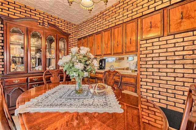 a view of a chairs and table in the patio