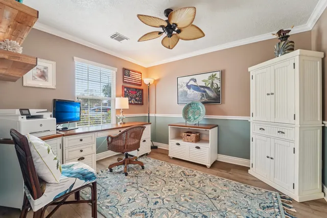 a workspace with furniture and window