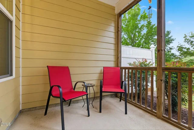 an aerial view of a house with a swimming pool