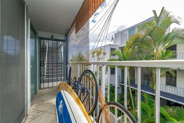 a view of kitchen with furniture and wooden floor