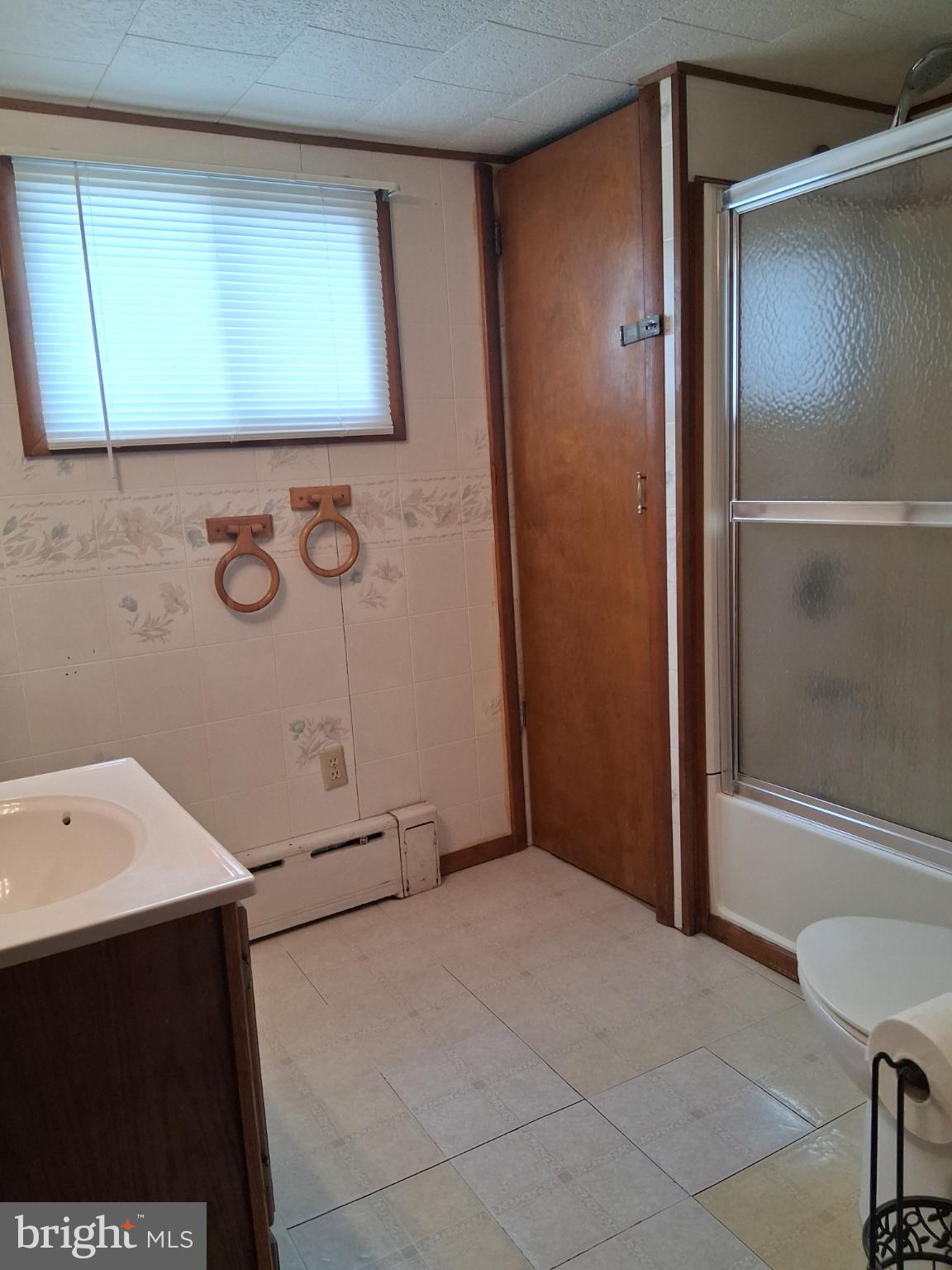 265 View Street Johnstown, PA 15902 - Photo 23 of 64 a bathroom with a sink and a mirror