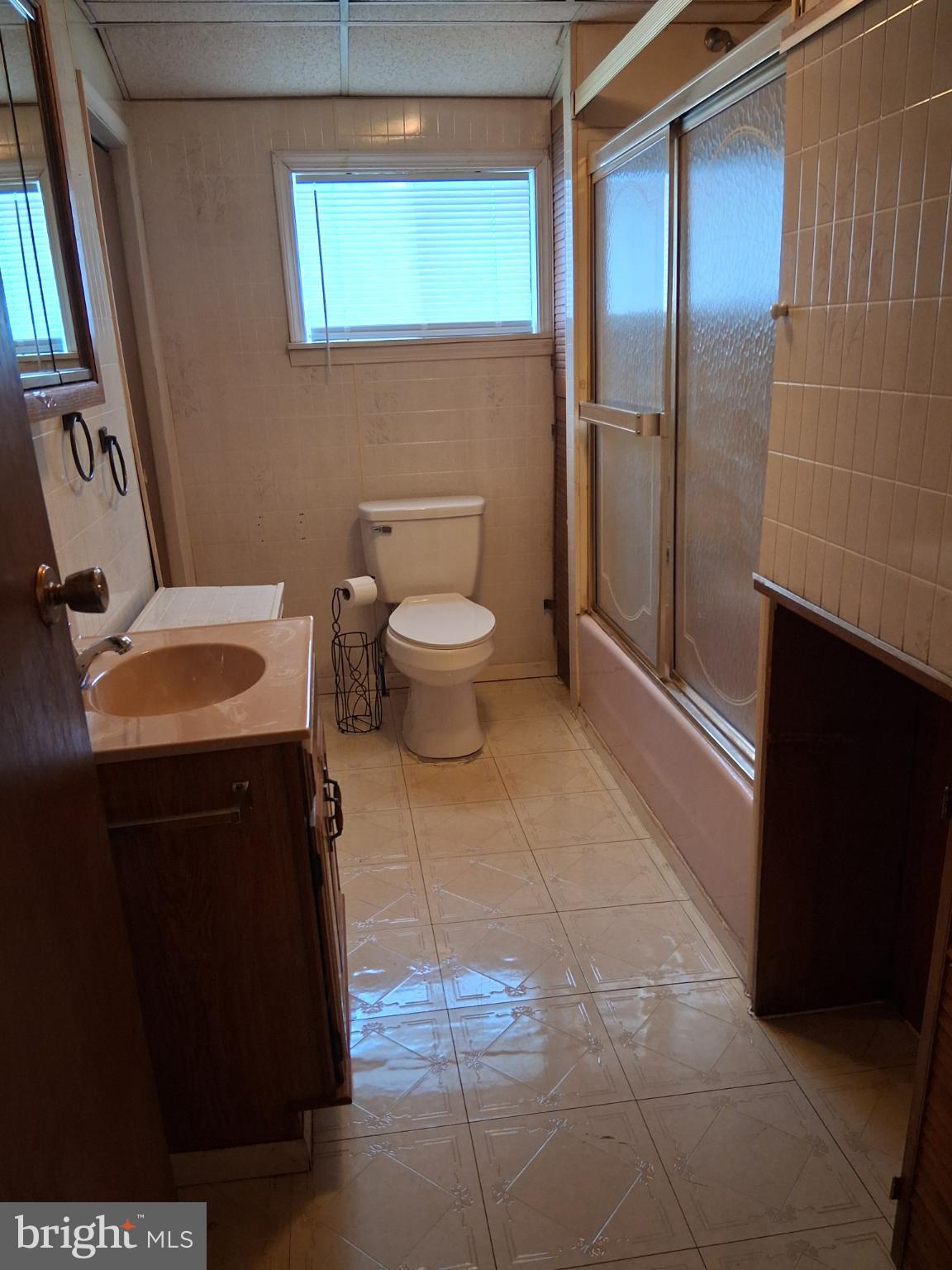 265 View Street Johnstown, PA 15902 - Photo 30 of 64 a bathroom with a sink a toilet and shower