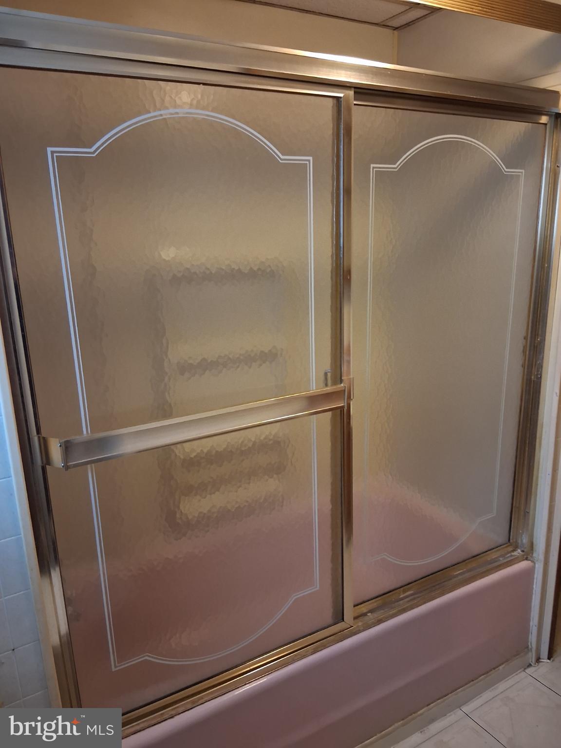 265 View Street Johnstown, PA 15902 - Photo 34 of 64 a bathroom with a glass shower door