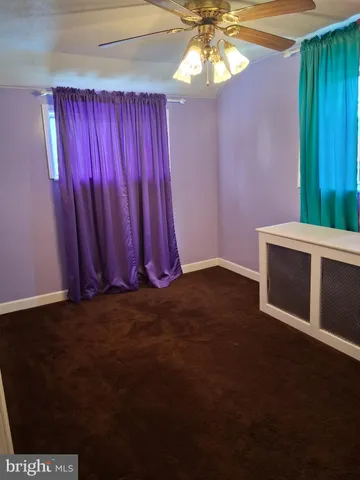 a view of entryway with flower plants