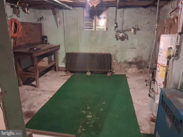 a view of porch with a table and chairs