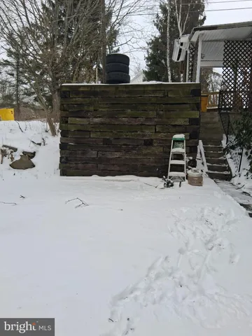 a house view with a backyard space