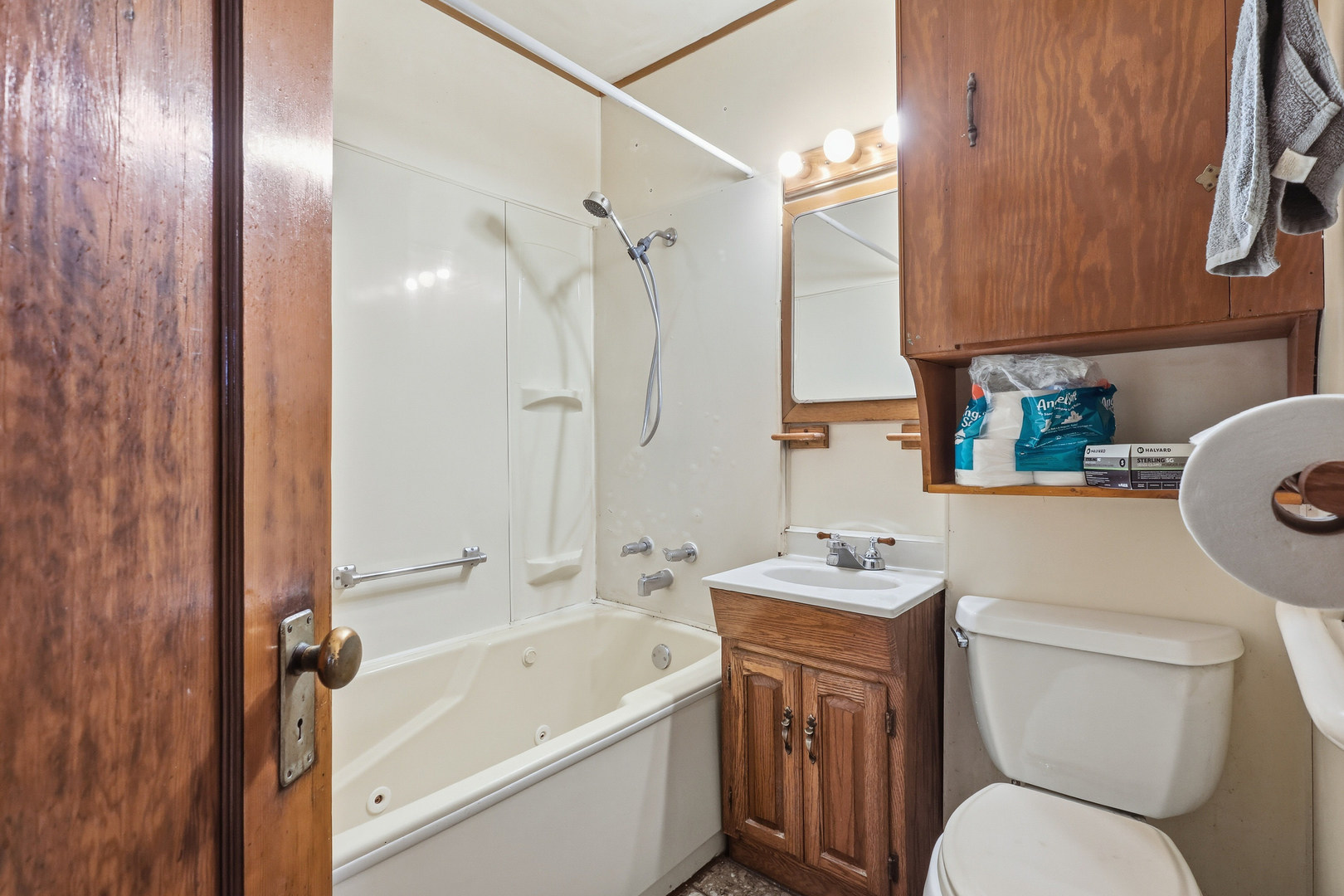2748 12th Avenue Moline, IL 61265 - Photo 20 of 35 a bathroom with a sink toilet vanity and shower