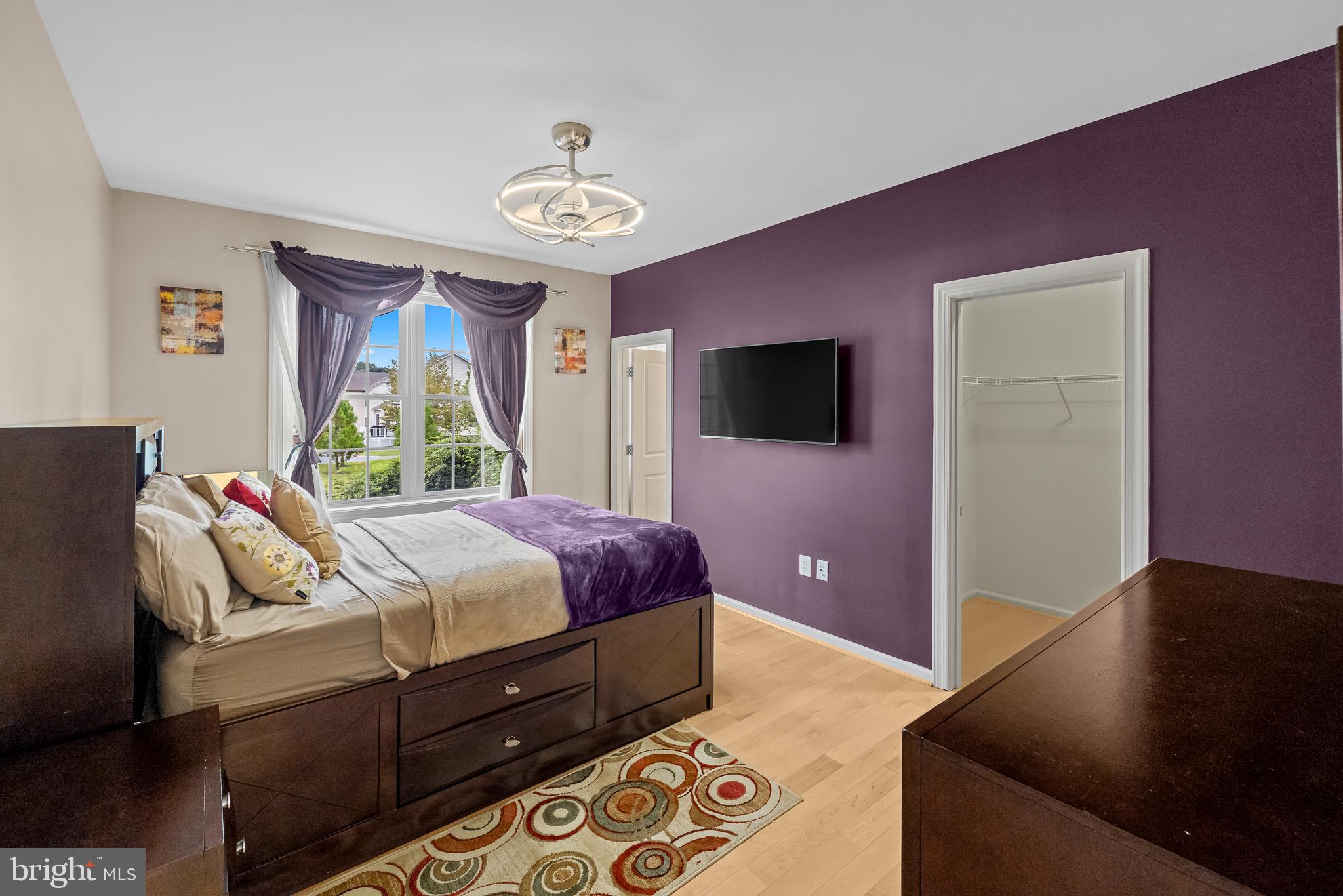 1116 Autumn Brook Avenue Silver Spring, MD 20906 - Photo 24 of 67 a bedroom with a bed and a flat screen tv