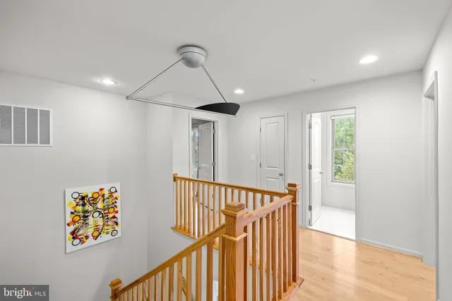 a spacious bedroom with a bed and window