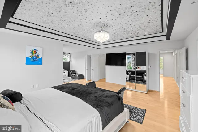 a spacious bathroom with a tub sink and shower