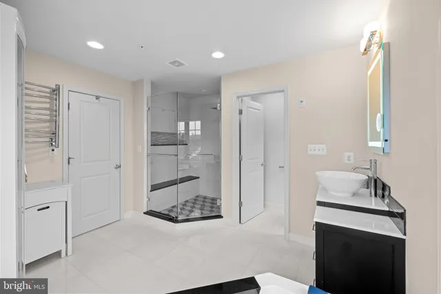 a view of a room with wooden walls