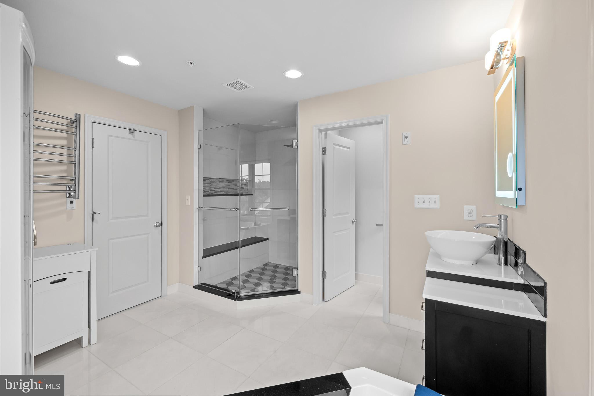 1116 Autumn Brook Avenue Silver Spring, MD 20906 - Photo 44 of 67 a bathroom with a sink and a mirror