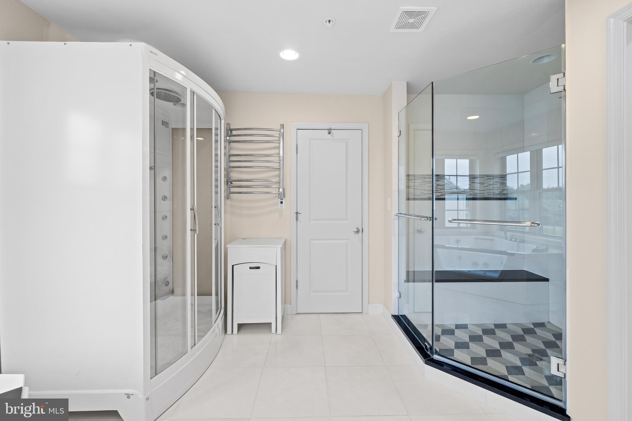 1116 Autumn Brook Avenue Silver Spring, MD 20906 - Photo 45 of 67 a bathroom with a glass shower door and a sink