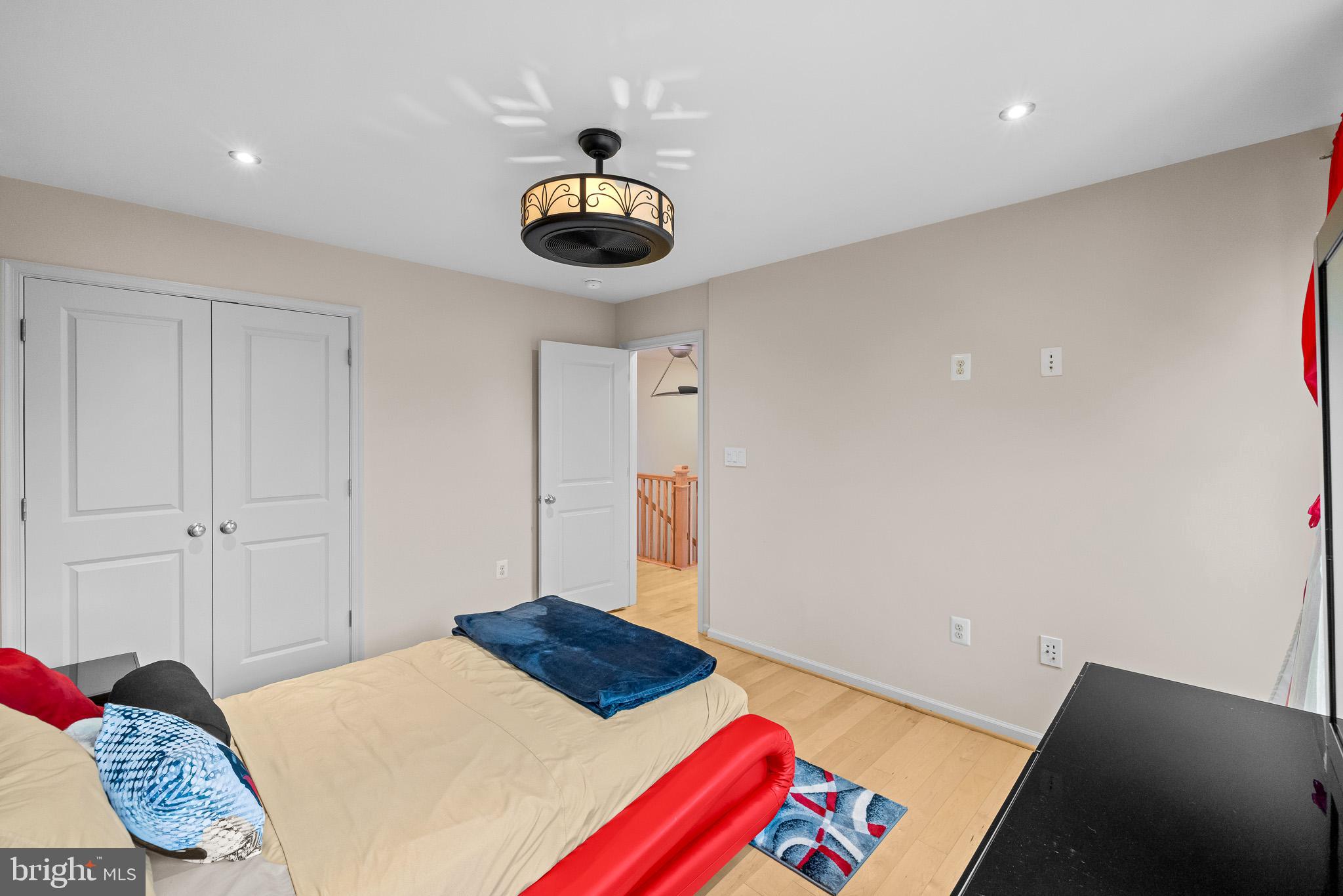 1116 Autumn Brook Avenue Silver Spring, MD 20906 - Photo 50 of 67 a bedroom with a bed and a lamp